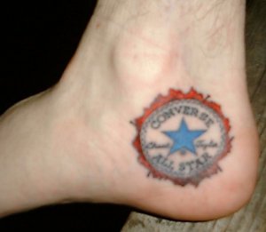 Michael's "Chuck" logo tattoo