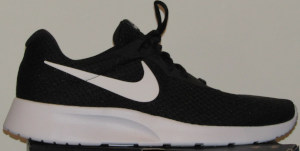 Black Nike Tanjun sneakers with white SWOOSH